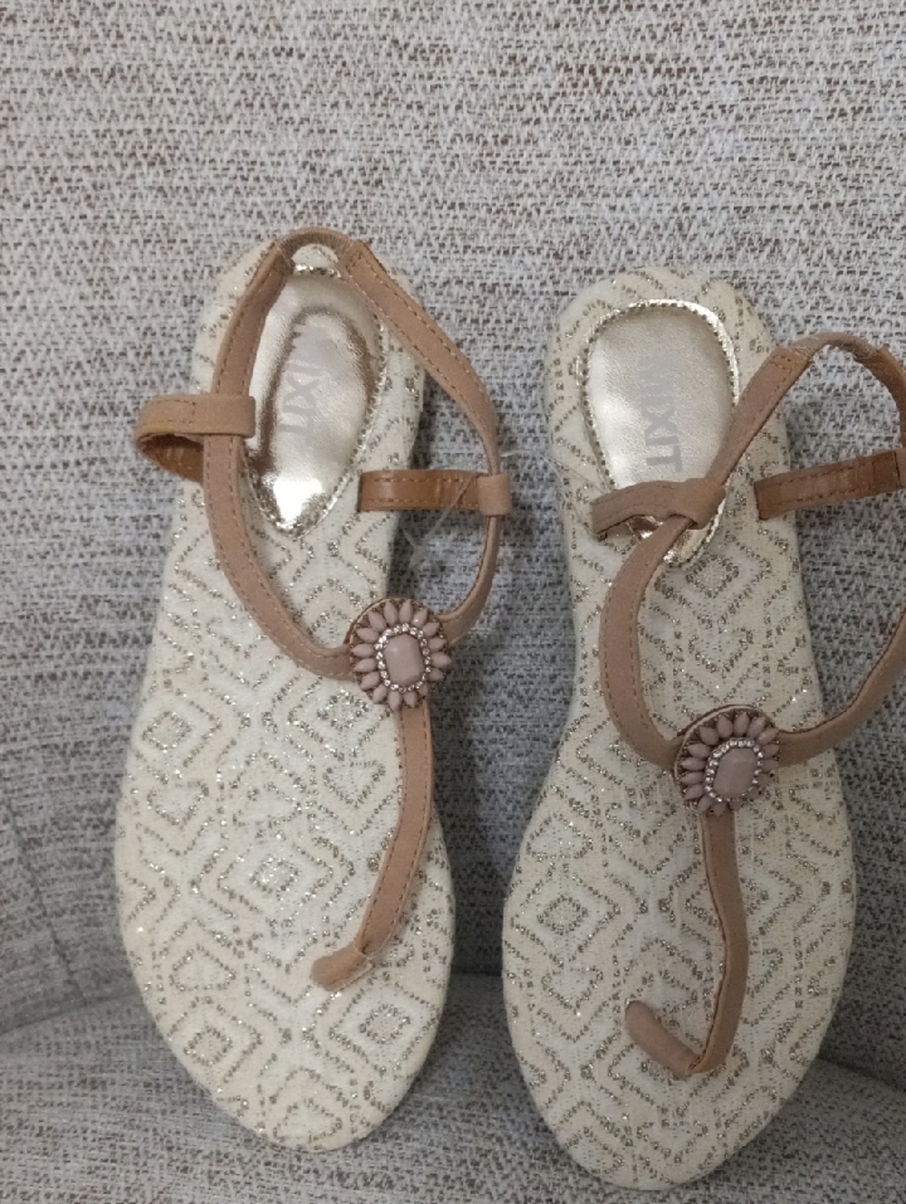 Mixit Cream and Tan T-Strap Sandals with Decorative Medallion